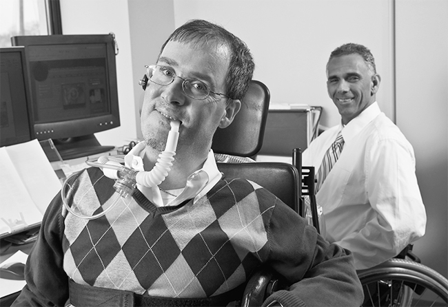 Man with disabilities with co-worker